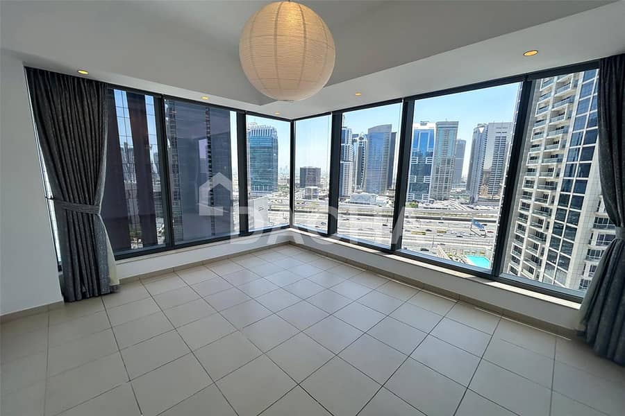 Unfurnished | Corner Unit | Mid Floor