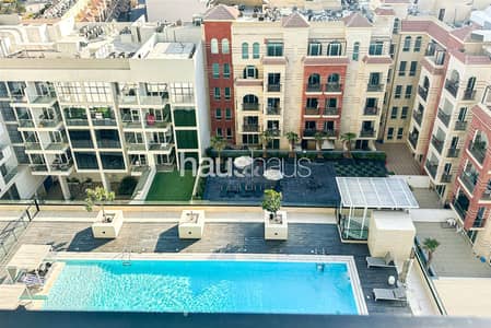 1 Bedroom Apartment for Sale in Jumeirah Village Circle (JVC), Dubai - Pool Facing View | VOT | Fully Furnished