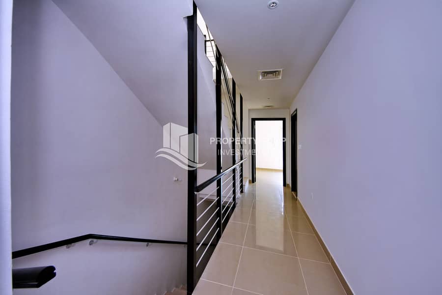 6 3-bedroom-abu-dhabi-al-reef-contemporary-village-corridor. JPG