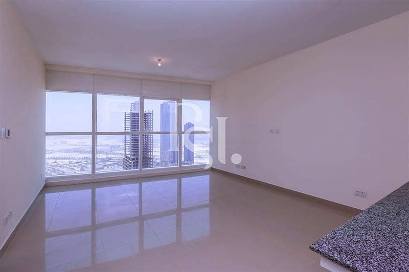 4 1-bedroom-abu-dhabi-al-reem-island-city-of-lights-sigma-tower-1-living-area (2). jpg
