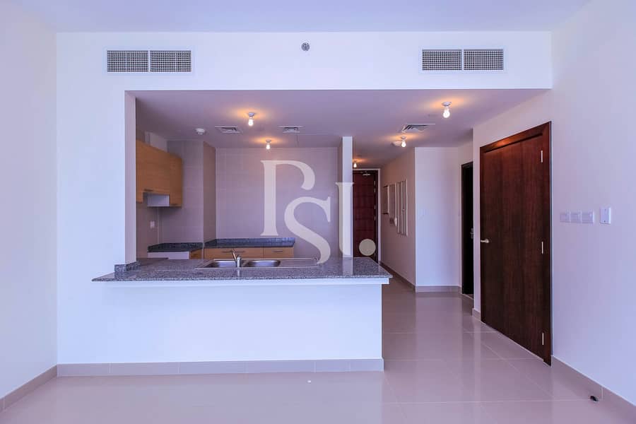 9 1-bedroom-abu-dhabi-al-reem-island-city-of-lights-sigma-tower-1-kitchen (2). jpg