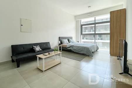 Studio for Rent in Jumeirah Village Circle (JVC), Dubai - Semi Furnished | Fitted Kitchen | Chiller Free