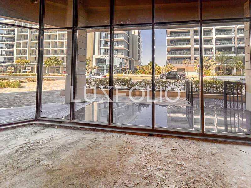 位于阿尔扬街区，圣特罗曲线公寓 的商铺 283500 AED - 11628372