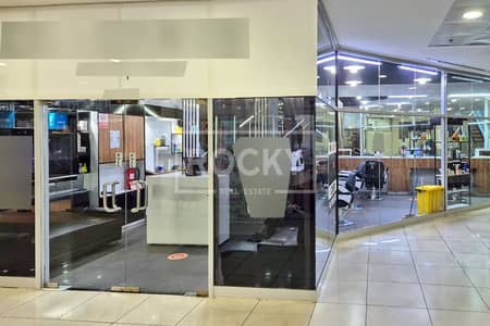 Shop for Sale in Dubai Silicon Oasis (DSO), Dubai - Lovely Fitted Shop | Best location | High ROI