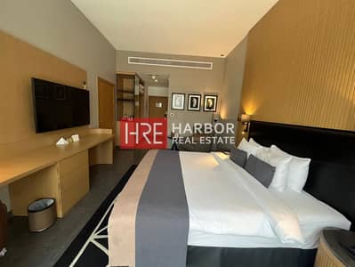 Hotel Apartment for Sale in Business Bay, Dubai - 25% Shares | Canal View | Revenue Report Available