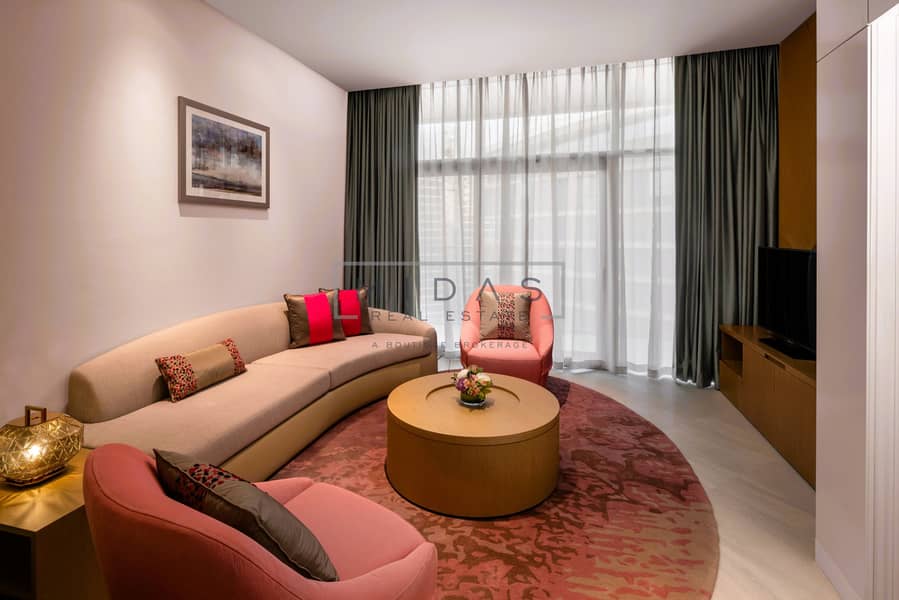 2 One Bedroom Apartment Living Room with Balcony JOCH_010_051223. jpg