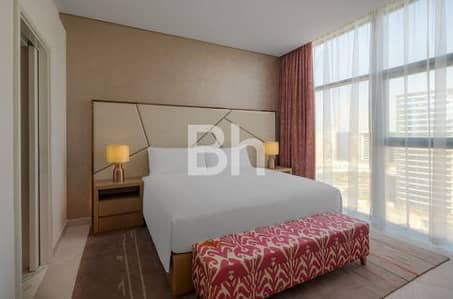 迪拉区， 迪拜 1 卧室酒店式公寓待租 - 位于迪拉区，赛义德港，Hilton Dubai Creek Hotel & Residences 1 卧室的酒店式公寓 135000 AED - 11314283