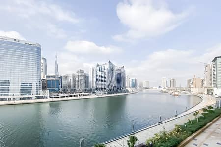1 Bedroom Apartment for Rent in Business Bay, Dubai - Bills Included | Fully Serviced | Burj and Canal Views