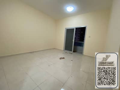 For rent, the largest two-bedroom apartment in Ajman, on the main street