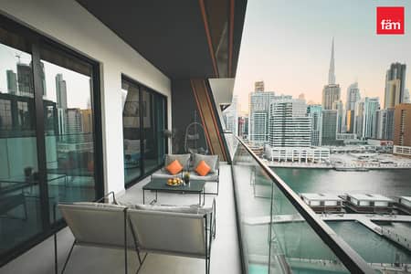 1 Bedroom Apartment for Rent in Business Bay, Dubai - Smart Home | Burj And Canal View | Sleek Interior