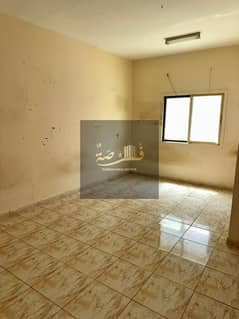 Room and hall 2 bathrooms in family-only building for annual rent in Al-Rashidiya 3, behind Grand Mall