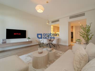 2 Cпальни Апартамент Продажа в Мотор Сити, Дубай - Living. jpg