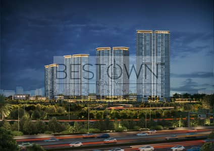 2 Bedroom Apartment for Sale in Motor City, Dubai - Sobha Solis - Night shot. jpg
