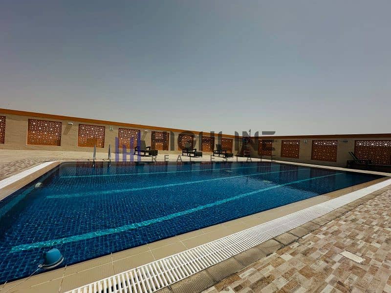 15 Al-Hikma-Residence-Swimmingpool-02. jpeg