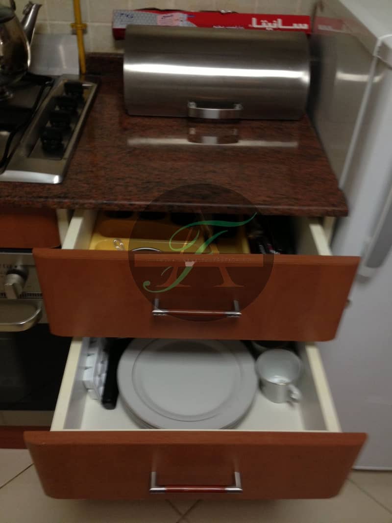8 KITCHEN CUPBOARD. jpeg