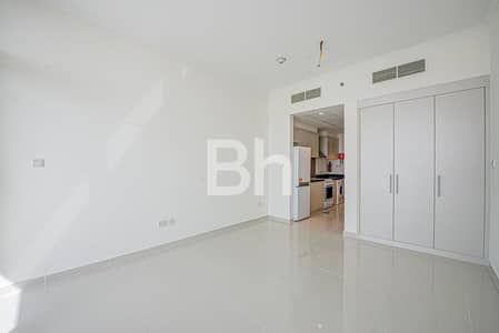 Studio for Rent in DAMAC Hills, Dubai - Vacant on 15 June | White Goods | High Floor