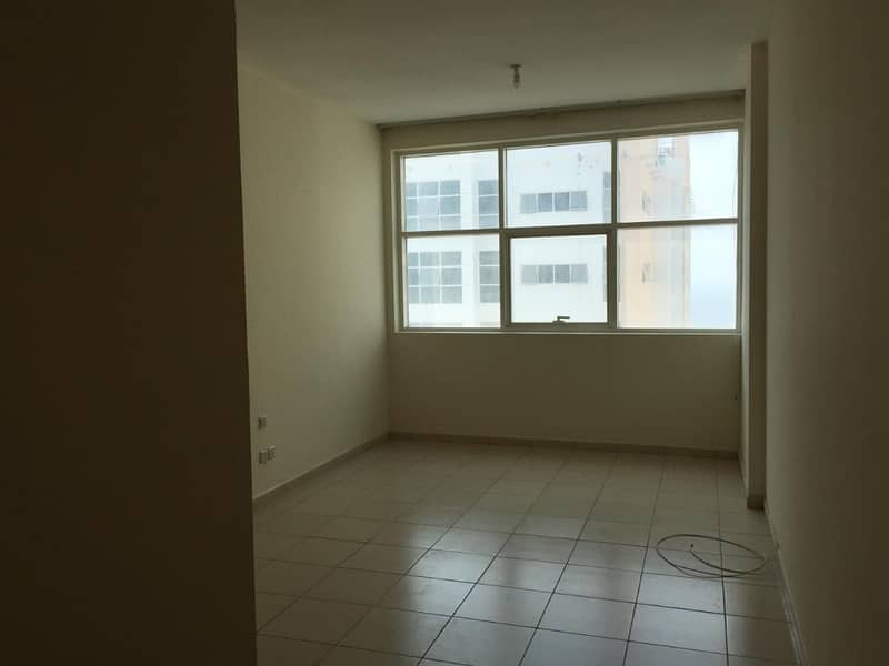 SPACIOUS HIGH FLOOR 2 BHK WIRH PARKING FOR SALE IN AJMAN ONE.