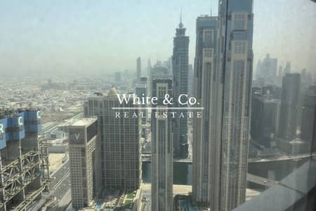 Studio for Sale in Business Bay, Dubai - High Floor Unit | Vacant | Canal View