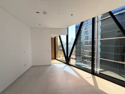 Stylish 1BR with Water Canal & Downtown Views | Modern Layout