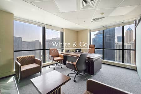 Office for Rent in Business Bay, Dubai - Corner Unit | High Floor | Canal View