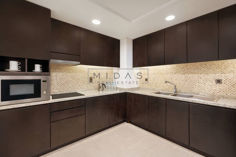 5 Family Three Bedroom Palm View Apartment - Fully Equipped Kitchen. jpg