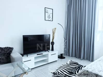 Studio for Sale in Jumeirah Village Circle (JVC), Dubai - Upgraded Furnished Studio | City View | High Floor
