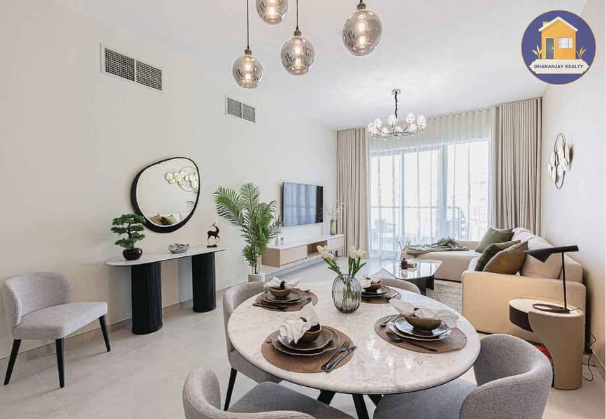 2 dining area in a 2 bedroom apartment for sale in majan Dubailand. jpg