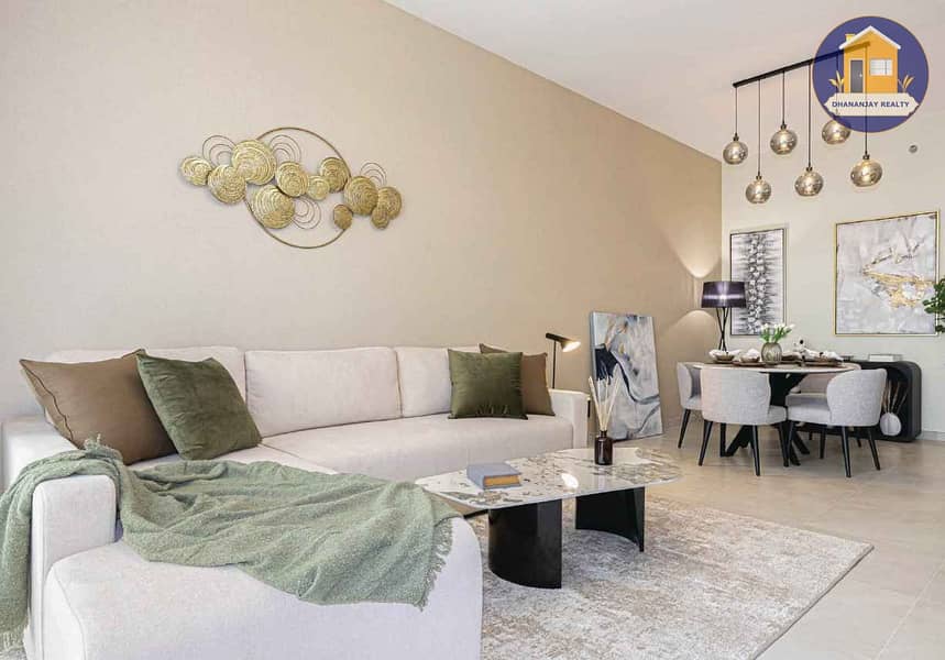 11 Spacious living room in a 2 bedroom apartment for sale in Majan Dubailand. jpg
