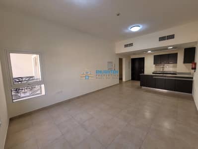 Studio for Rent in Remraam, Dubai - Big L-Shape | Near Community Centre | Podium View