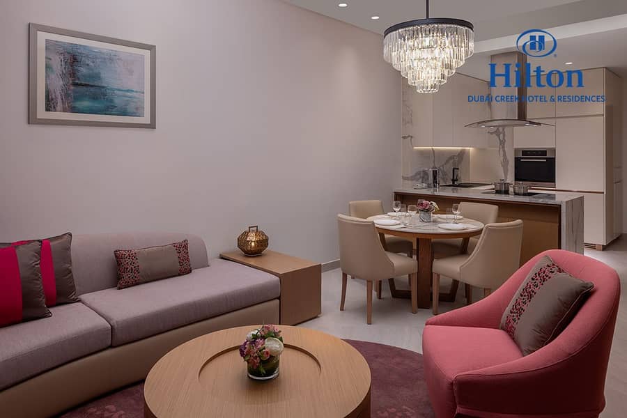 2 One Bedroom Apartment City View Living Room JOCH_011_051223. jpg