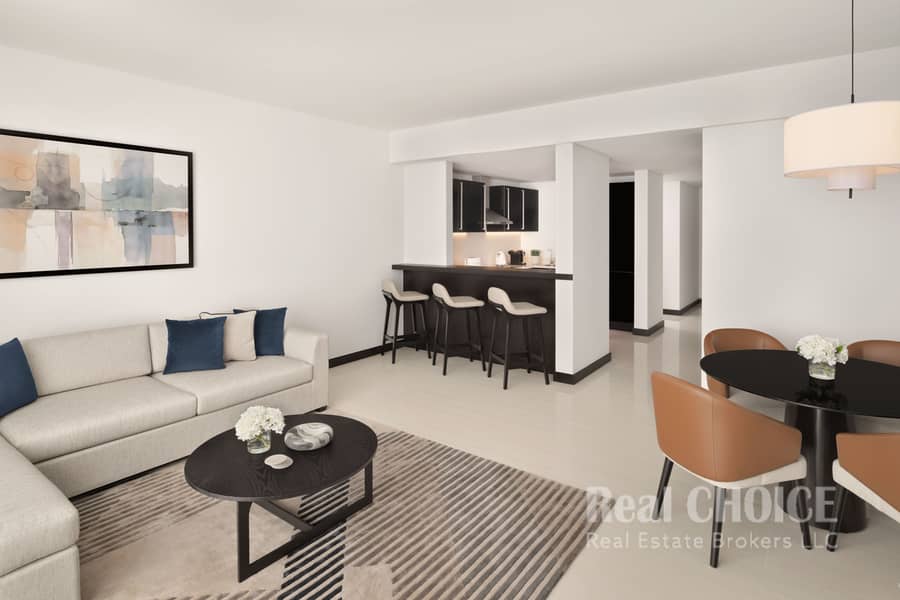 2 Two-Bedroom Apartment - Living + Dining + Kitchen. JPG