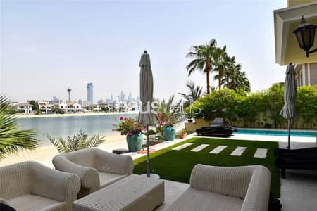 4 Bedroom Villa for Rent in Palm Jumeirah, Dubai - Upgraded | High number | Beach | Large pool