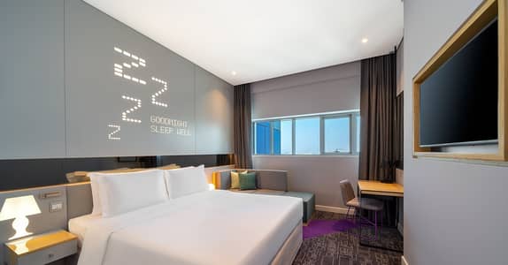 Studio for Rent in Barsha Heights (Tecom), Dubai - Urban King Room open Curtain. jpg