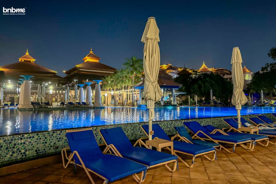 76 Swimming Pool Near Beach Night Photos (1). jpg