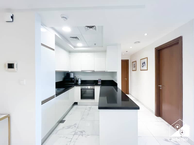 8 Amna Tower 5808 - 2B - Kitchen - 1. jpg