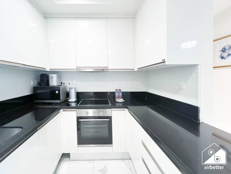 9 Amna Tower 5808 - 2B - Kitchen - 2. jpg