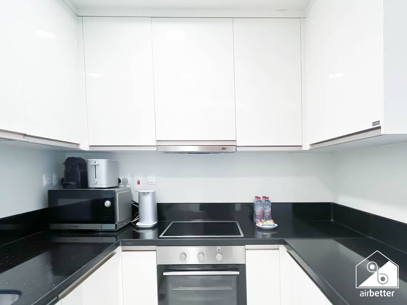 10 Amna Tower 5808 - 2B - Kitchen - 3. jpg