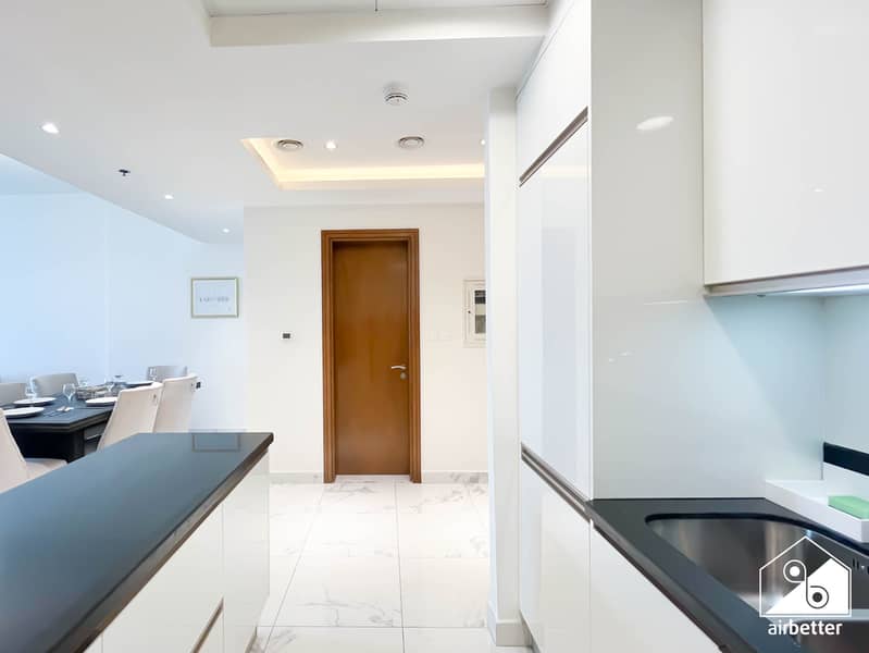 11 Amna Tower 5808 - 2B - Kitchen - 4. jpg