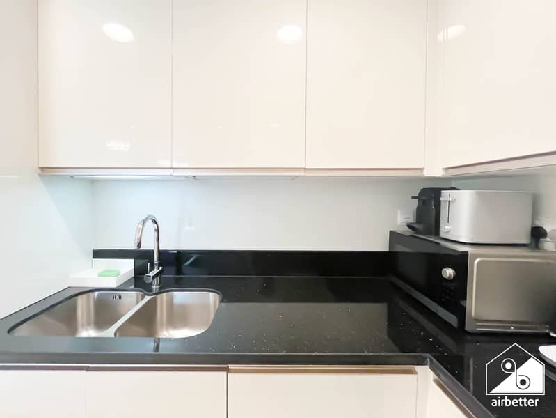 12 Amna Tower 5808 - 2B - Kitchen - 5. jpg