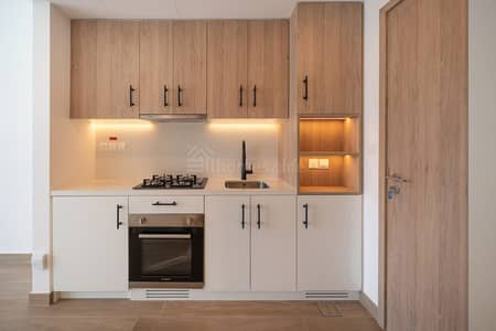 Studio for Rent in Town Square, Dubai - BRAND NEW | POOL VIEW | WITH KITCHEN APPLIANCES
