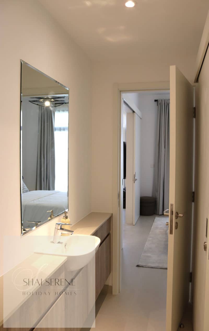 24 23. Bathroom Sink Area Downstairs. JPG