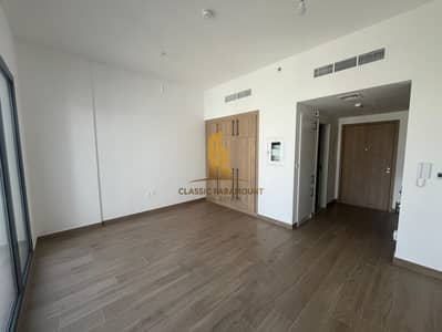Studio for Rent in Town Square, Dubai - Pool View | High Floor | Semi-furnished Kitchen