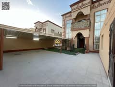 A 5,000-square-foot villa for rent in Al-Muwaihat 2. It features five bedrooms, a furnished living room, and air conditioning.