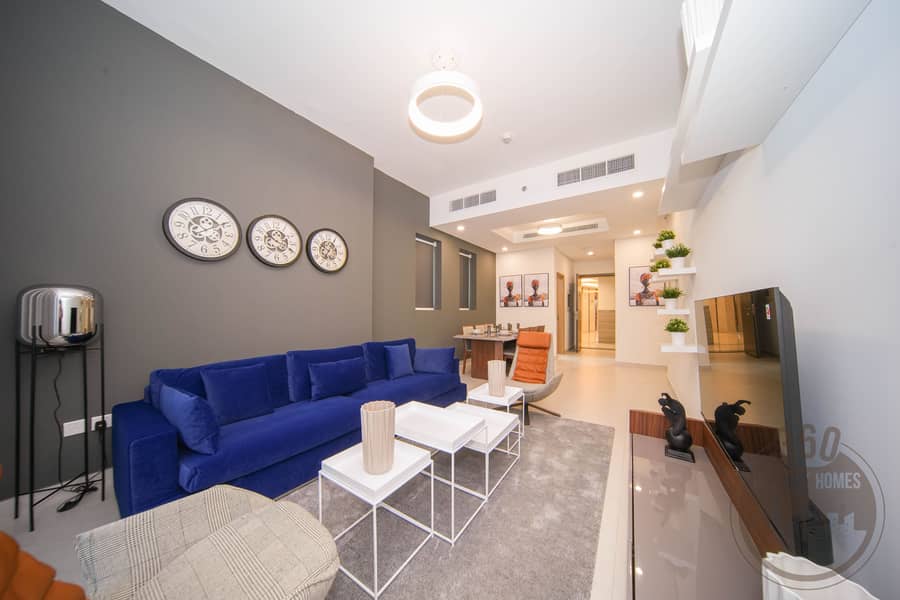 Chic 2BR with Balcony & Rooftop Pool Featuring Burj Khalifa Views