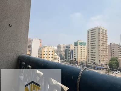 شقة 2 غرفة نوم للايجار في منطقة الرولة، الشارقة - شقة  مكونة من غرفتين نوم مع بالكون بالصالة ، اول ساكن ، قريبة من  مخرجي دبي و عجمان