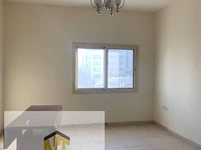 1 Bedroom Apartment for Rent in Bu Tina, Sharjah - 1 BHK Apartment + Free Parking for Rent in Al Butina – Sharjah | Prime Location Near All Services