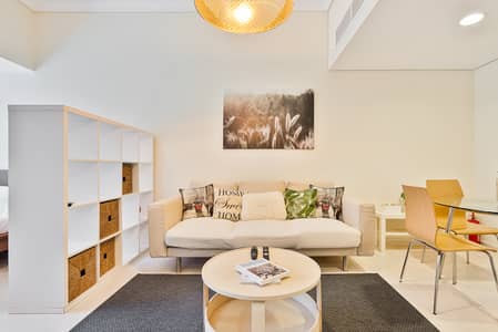 استوديو  للايجار في أبراج بحيرات الجميرا، دبي - Living area (7). jpeg