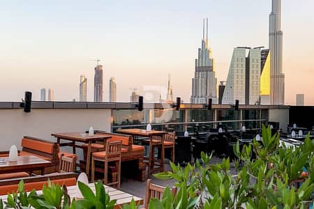 محل تجاري  للايجار في شارع الشيخ زايد، دبي - محل تجاري في فندق كارلتون داون تاون،شارع الشيخ زايد 1800000 درهم - 11970199