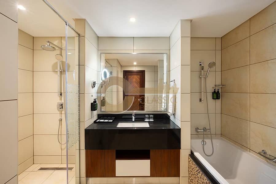 2 3-Bedroom-Apartment-Royal-Continental-Family-Hotel-Apartment-with-Dubai-Canal-view-8. jpg