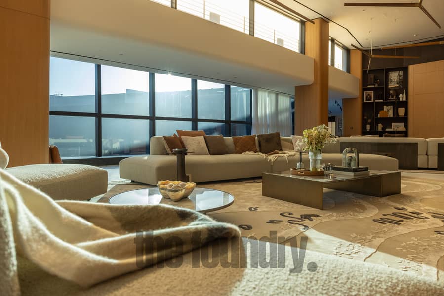 36 The OPUS Penthouse by OMNIYAT Double-Height Living Area 3. jpg